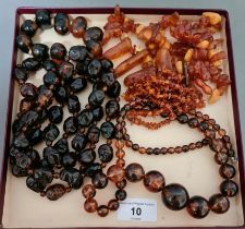 Assorted amber and similar beads.