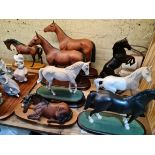 8 pottery horses on wooden bases to include Beswick, Royal Doulton, etc.