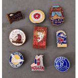 A tin of various Butlin's & Pontin's pin badges.