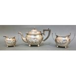 A three piece hallmarked silver tea set, gross wt. 21ozt.