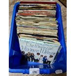A box of vinyl singles/ 45s, approximately 90.