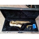 An alto saxophone, made by C G Conn Ltd, Elkhart Ind, USA, 'Patd Dec 8, 1914, A M207672 L', in case.