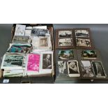 A box of vintage postcards to include 2 albums