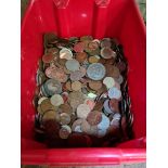 A box with assorted coins.