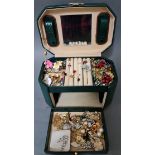 A jewellery box containing vintage and modern costume jewellery, mainly earrings.