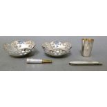 A pair of silver dishes with pierced rim, marked Silver, a Russian silver kiddush cup with gilt