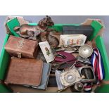 A box of collectables to include a cast metal figure, Autograph book, vintage corkscrews, police