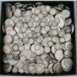 A tray of various GB coins dated between 1920-1946 to include shillings, 2 shillings, florins,