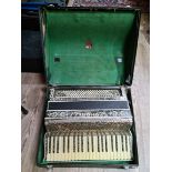 A vintage piano accordian, made by Scandalli, Camerano, Italia, in case.