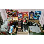 Two Atari 2600 games consoles with assorted games, various Megdrive games and a PS1 with two