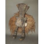 An Ogoni tribe warthog protection mask with Dutch museum label to verso, length 54cm.