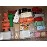 A box of Dinky & Matchbox die-cast model vehicles.