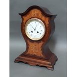An inlaid mahogany cased Edwardian mantel clock with pendulum and key, height 36cm.