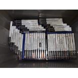 A box of PS2 games.