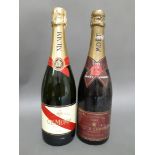 Two bottles of champagne Moet & Chandon 1981 and G.H. Mumm.