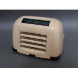 A Kolster Brandes cream bakelite radio.