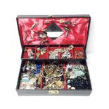 A box of assorted costume jewellery.