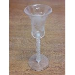 A late 18th century lattice twist stem and etched drinking glass, height 15.5cm.