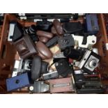 A crate of assorted vintage cameras including a Miranda EE-2 etc.