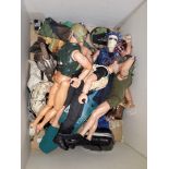 A box of Action MAn figures and accessories.