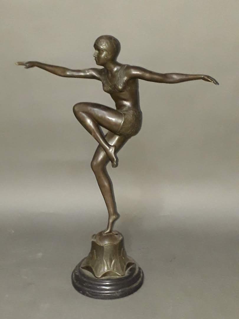 A modern Art Deco style bronze figure on marble base, height 46cm.
