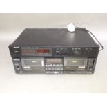 ROTEL RT850AL tuner and a Hitachi D-W800 side by side stereo cassette deck.