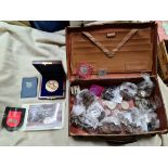 A case of assorted GB and coins and medallions.