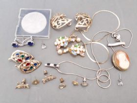 A selection of jewellery to include a 9ct gold necklace, various pairs of earrings, a cameo