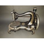 A Jones Hand Machine sewing machine.