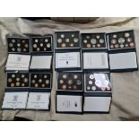 A collection of 9 UK Proof Coin Sets comprising of 1983(with cert), 1985,1986(with cert),1987(with