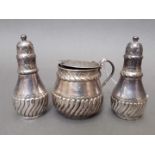 A Victorian three piece silver cruet, Stokes & Ireland, Birmingham 1883, wt. 4ozt.