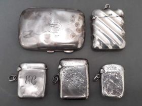 A collection of hallmarked silver vesta cases and a small cigarette case, gross wt. 3.6ozt.