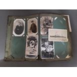 An early 20th century postcard album, approx. 120 cards, mainly tourist and portraits.