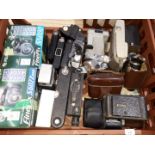 A box of assorted vintage cameras including Pentax, Kodak etc.