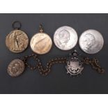 A mixed lot comprising a gold plated locket on chain, a WWI Victory medal awarded to 58807 PTE J