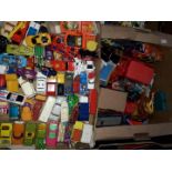 Two boxes of toys including Ghost Busters, RC mini, mixed die-cast, Corgi, Hotwheels and Matchbox