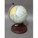 A Chad Valley tin plate terrestrial globe, height 28cm.