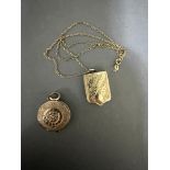Two yellow metal lockets, one on 9ct gold chain wt. 1.8g.