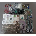 A collection of Venetian glass jewellery and various pearl necklaces with silver clasps, etc.