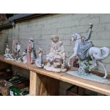 A group of nine figures to include four Nao, three Lladro, one Tengra and one Austin Prod. Inc.