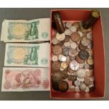 A box of assorted UK coins and banknotes including old silver coins, collectors coin holders etc.
