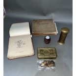 A collection of WWI era items including brass Christmas box 1914, 10 military buttons, brass post