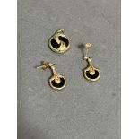 A pair of 9ct gold and black onyx drop earrings together with a matching 9ct gold and black onyx