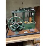 A well engineered scale model of a six column rotative beam engine, on wooden base and plinth, total