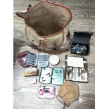 A Brady Halesowen fishing bag containing various fishing tackle, lures, an Abu Ambassadeur G500C