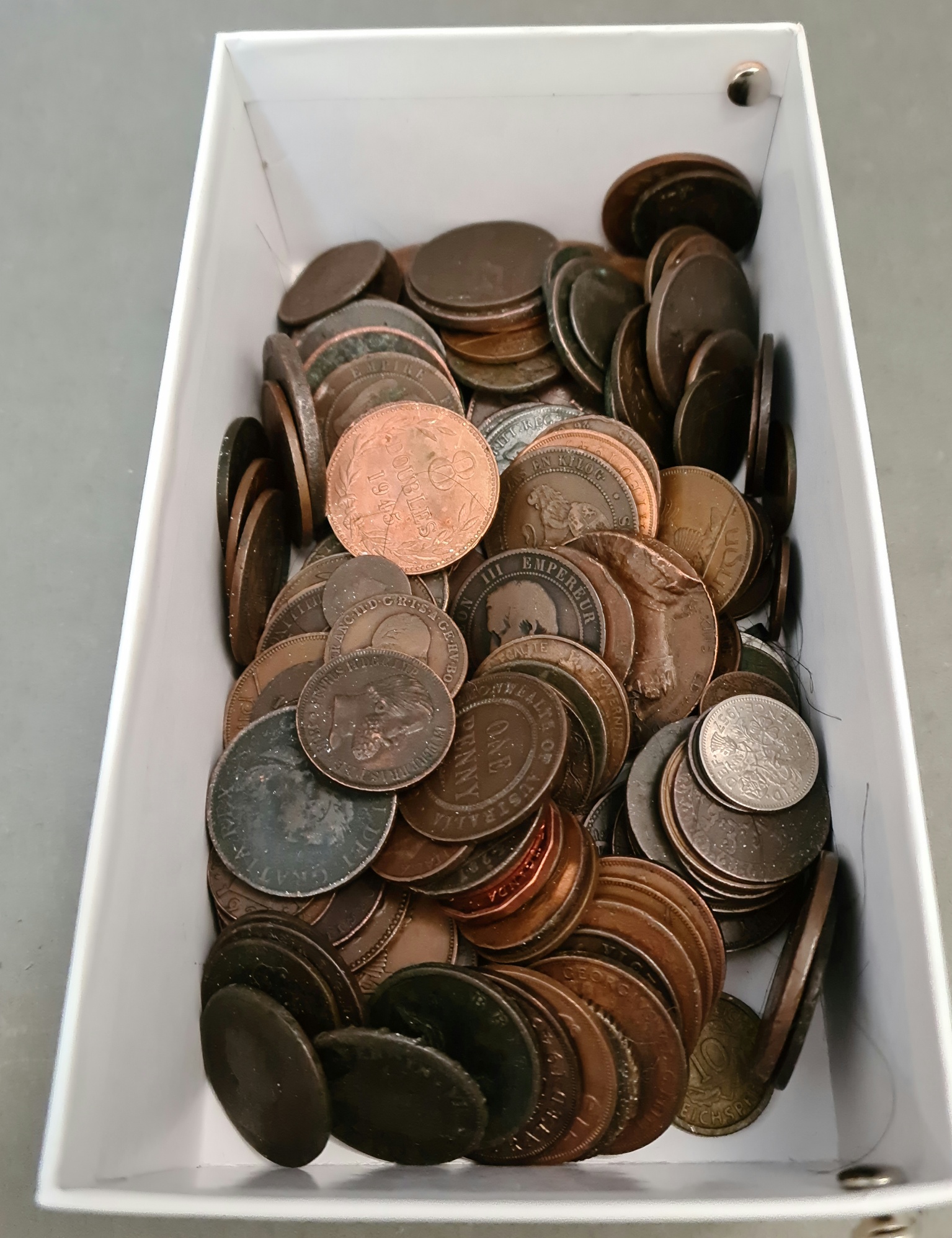 A box of mainly bronze coins from UK and Channel Islands