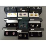 A collection of cuff-links to include silver, stainless steel, enameled, etc, all with associated