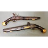 A pair of flintlock pistols, the side plates stamped 'Tower' and 'GR', brass also numbered 5271 &