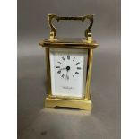 A brass "Wellington" carriage clock.