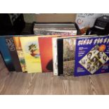 A box of assorted LPs, various genre and artists including Rod Stewart etc.